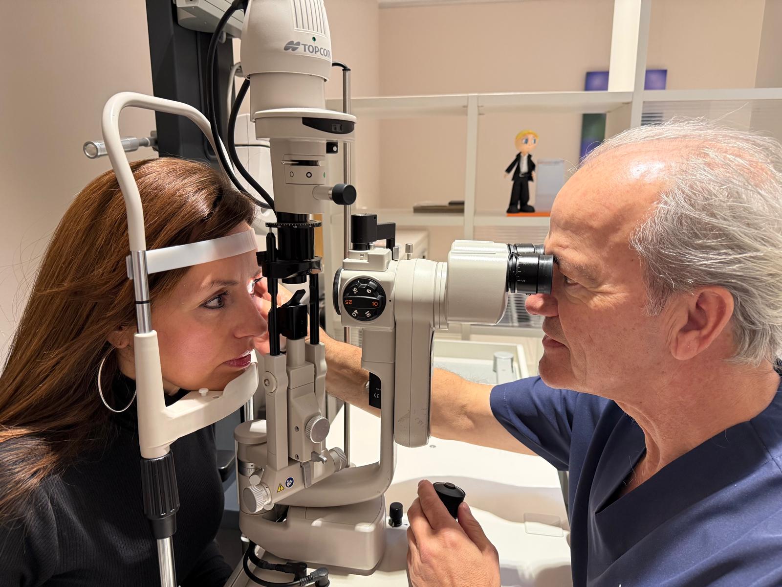 Doctor examining patient eyes