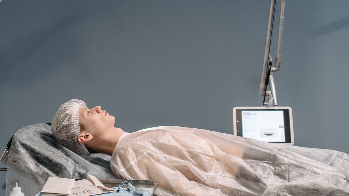 Patient undergoing laser eye surgery (LASIK)