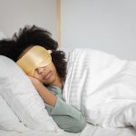 Person asleep in bed